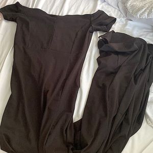 Long black off the shoulder dress.